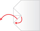Step 7: Turn the paper over to give - Sabretooth Paper Airplane